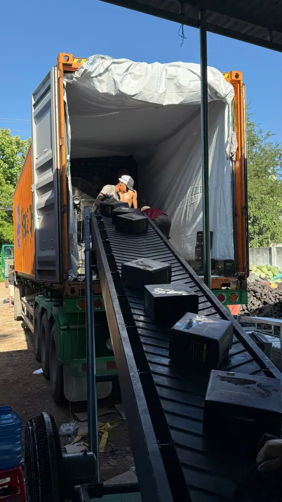 Conveyor-Assisted Charcoal Container Loading